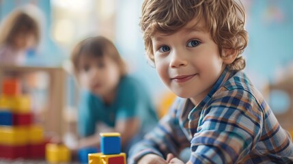 A boy and his male companion are stacking toy blocks.