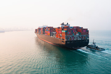 Aerial view of sea freight, Cargo ship, Cargo container in factory harbor at industrial estate for...