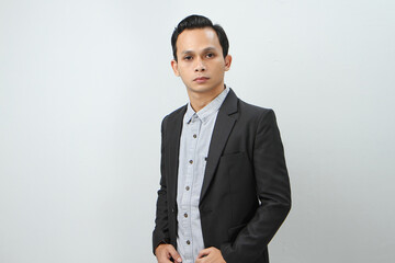 portrait of asian indonesian business man in suit on isolated background