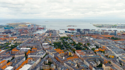 Copenhagen, Denmark. Panorama of the city center and port in cloudy weather. Summer day, Aerial View