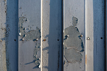 The paint crumbles on various materials.