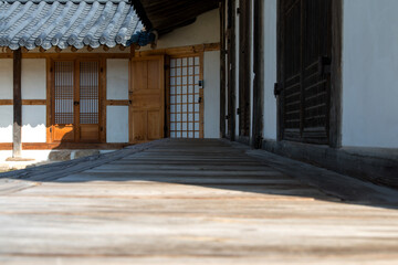 The exterior with the wooden balcony in a rural traditional Korean house