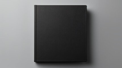 Black Book Cover on Gray Background.