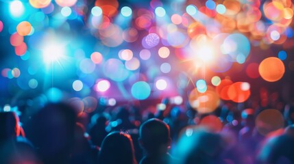 Crowd at concert and blurred stage lights - obrazy, fototapety, plakaty