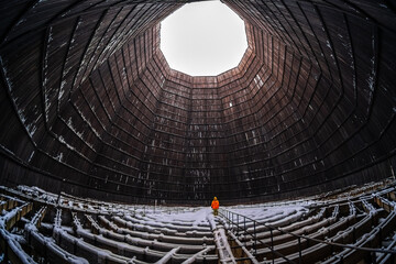 Worker inside a cooling tower