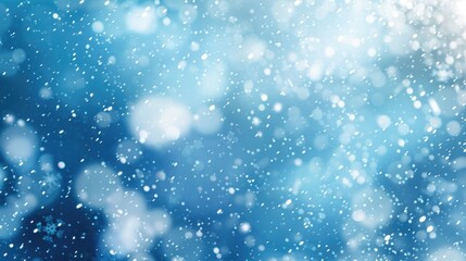 A blurry image of falling snow. Perfect for winter-themed designs