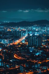 Obraz premium Cityscape view at night from a high rise building, ideal for urban concepts