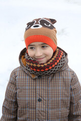 Fun child, fashion kid, cute happy boy. Winter nature, landscape. Outdoor recreation, fun rest. Winter look, seasonal outfit of child. Cold weather	
