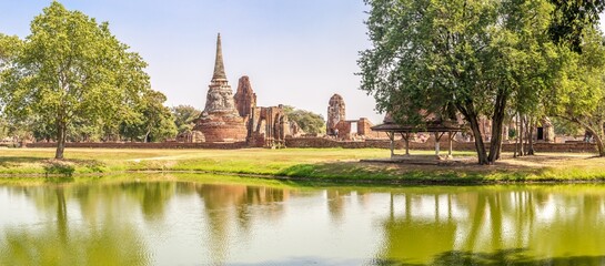 Panoramic view at the ruins of Mahathat Wat in the streets of Ayutthaya - Thailand - 749815100
