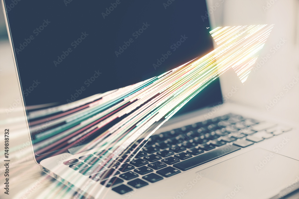 Poster Close up of laptop with mock up place on desk with creative high-speed motion arrow on blurry background. Dynamic energy and technology concept. Double exposure.
