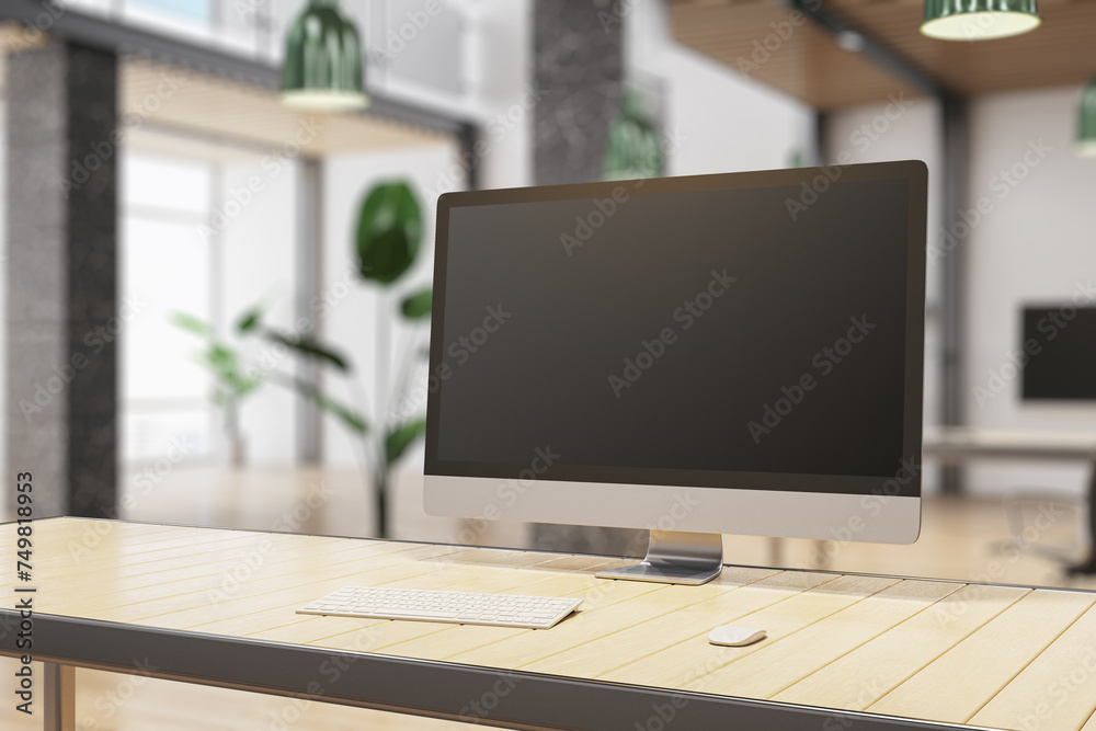 Poster creative designer desk top with empty mock up computer montior, supplies and blurry office interior 