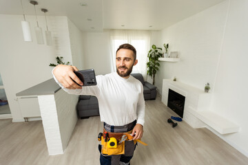 Good day mood build builder construction constructor engineer workman repairman concept. Close up photo portrait of cheerful glad handsome beaming toothy bearded guy make take selfie on smart phone.