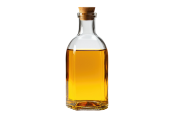 Bottle of Oil. A clear glass bottle filled with oil stands on a plain white background. The label is visible, reflecting light. The bottle is upright and stationary.