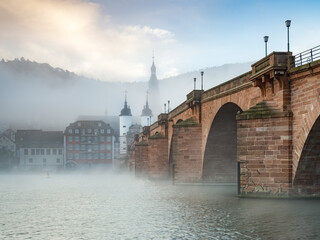 Morning fog at the old bridge (Alte Brücke) in Heidelberg, Germany