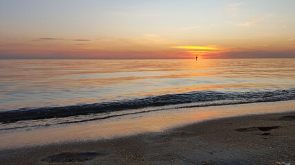 Fototapeta na wymiar Vivid summer sunset near at a beach in Melbourne, Australia
