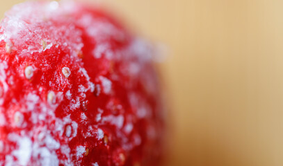 Extreme close-up of frozen strawberries