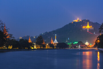 Night view of Mandalay palace and Mandalay Hill in Myanmar Burma - 749843138