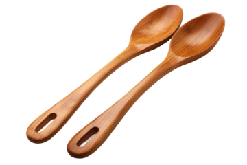 Two Wooden Spoons Together. Two wooden spoons are placed side by side on a flat surface. The spoons are identical in size and shape with smooth handles and rounded bowls.