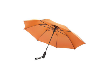 Orange Umbrella With Black Handle. An orange umbrella with a black handle stand upright against a plain white background. The umbrella is closed highlighting its orange color against the stark white.