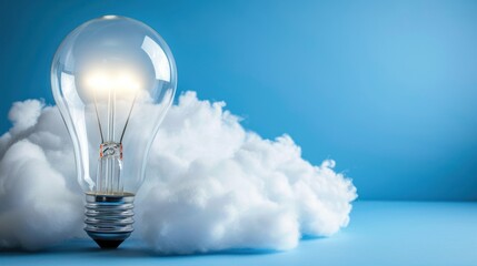 a light bulb sitting on top of a pile of clouds of white cotton on a blue background with a blue sky in the background.