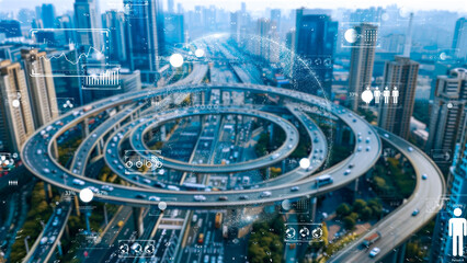 Modern cityscape with an intricate network of roads and digital interfaces for urban analytics.