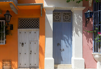 Colonial facades with wooden doors in the historic center of Cartagena, Colombia.