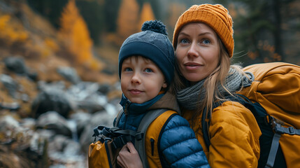 A close-up of a mom and her son geared up for a hiking adventure, their faces alight with excitement and anticipation, set against the backdrop of a rugged trail.