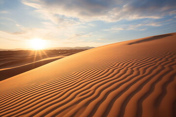 Fototapeta na wymiar Amazing desert sunset. Beautiful desert with warm colors. Colorful contours of sand dunes.