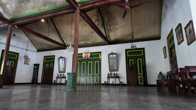Large hall for meetings or ceremony ritual or performance with smooth cement flooring in a traditional jogja javanese buildings.