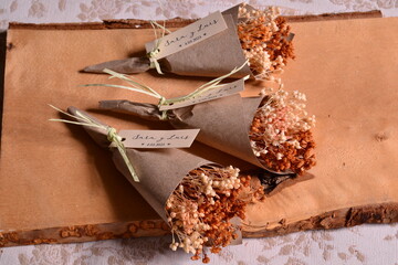 Wedding favors mini bouquet dry flowers with craft brown paper wrapping, ribbon, custom label, text...
