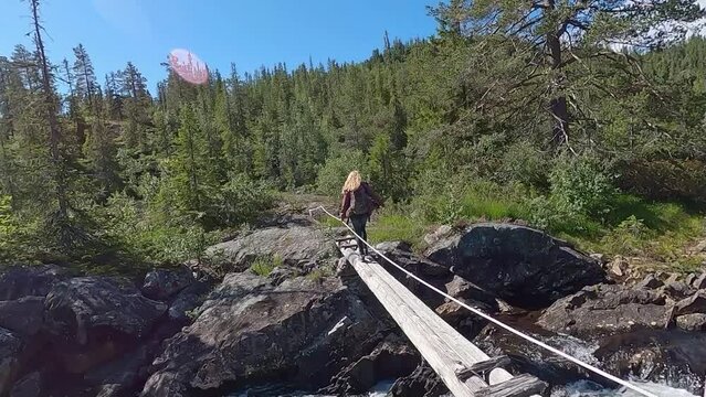 Hiking adventure along an idyllic wild river (B&oslash;) in province Vestfold and Telemark (Vestfold og Telemark), Norway