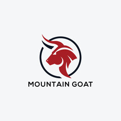 White Goat On The Mountain Logo Design. Goat standing proudly on the top of the mountain Logo Design
