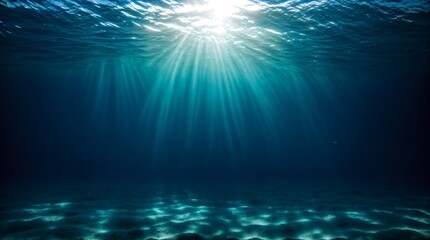 Sunlight gently shimmering through tranquil ocean depths, forming a serene underwater backdrop 