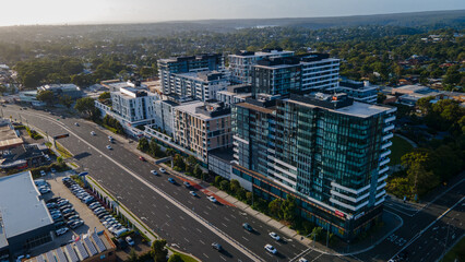 Aerial drone view of commercial and residential buildings at Kirrawee in the Sutherland Shire,...