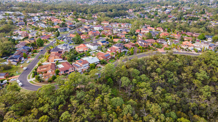 Fototapeta na wymiar Aerial drone view over Menai, in the Sutherland Shire, South Sydney, NSW Australia on the western side of Alfords Point Road in March 2024