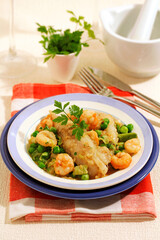 Monkfish tails with prawn and young garlic.