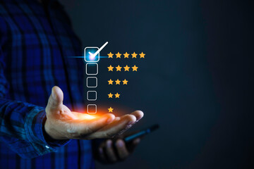 Satisfaction survey, service experience on online application, Customer give rating to service on application. questionnaire for experience or customer satisfaction research. Five star show on hand.