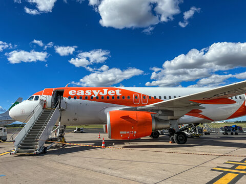 The airplane of easyjet airlines staying at Montpellier Airport. EasyJet plc, styled as easyJet, is a British multinational low-cost airline group.