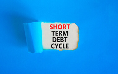 Short term debt cycle symbol. Concept words Short term debt cycle on beautiful white paper. Beautiful blue background. Business Short term debt cycle concept. Copy space