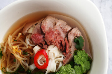 Pho Bo vietnamese soup with beef and noodles