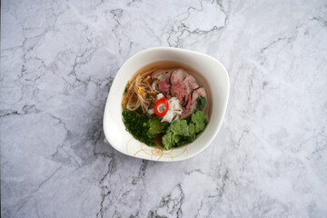 Pho Bo vietnamese soup with beef and noodles