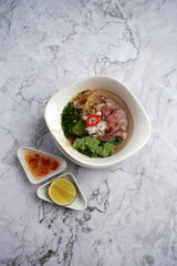 Pho Bo vietnamese soup with beef and noodles