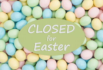Fototapeta na wymiar Closed for Eater sign with Easter eggs candy