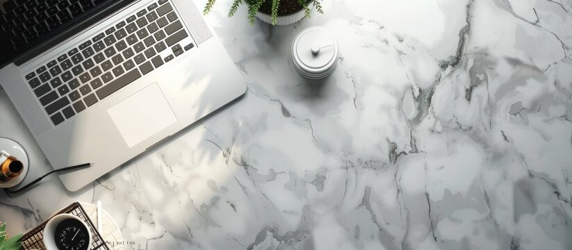 Top view laptop and office supplies copy space on white marble table background. Generated AI image