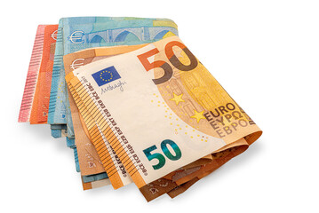 Folded euro banknotes isolated. Bundle of 50, 20 and 10 euro banknotes.