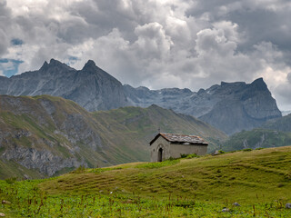 A small chapel close to Glière lake  on a cloudy day in Vanoise National Park, French Alp, Champagny en Vanoise