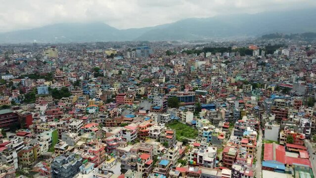Aerial view of Kathmandu, Nepal. Asian-style houses in the Himalayas. Cityscape with roads in downtown. 
