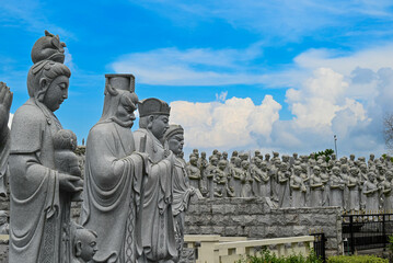 various statues photographed out of 500 statues of worshipers. A very scenic buddha temple in...