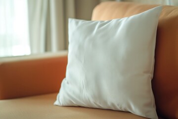 Blank white pillow, white pillow lies on the sofa