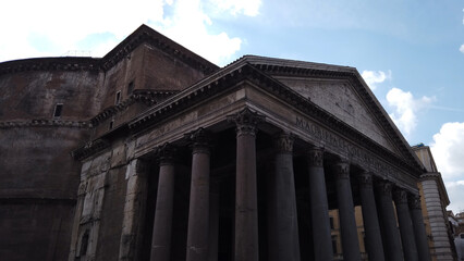 Fototapeta na wymiar The Roman Pantheon is the best-preserved building from ancient Rome, Italy, and was completed in c. 125 CE. Latin letters mean: 
